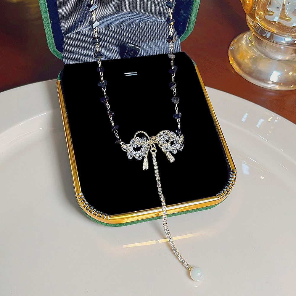 European and American super fairy crystal tassel bow necklace, women's niche light luxury exquisite collarbone chain, ins style sweater chain details Picture