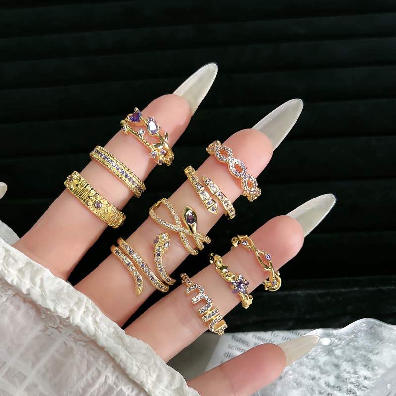 New sweet and cool Star Purple diamond Nine Purple Fire Escape ring for the Year of the Snake, adjustable snake-shaped light luxury high-end index ring for women Application Scenario