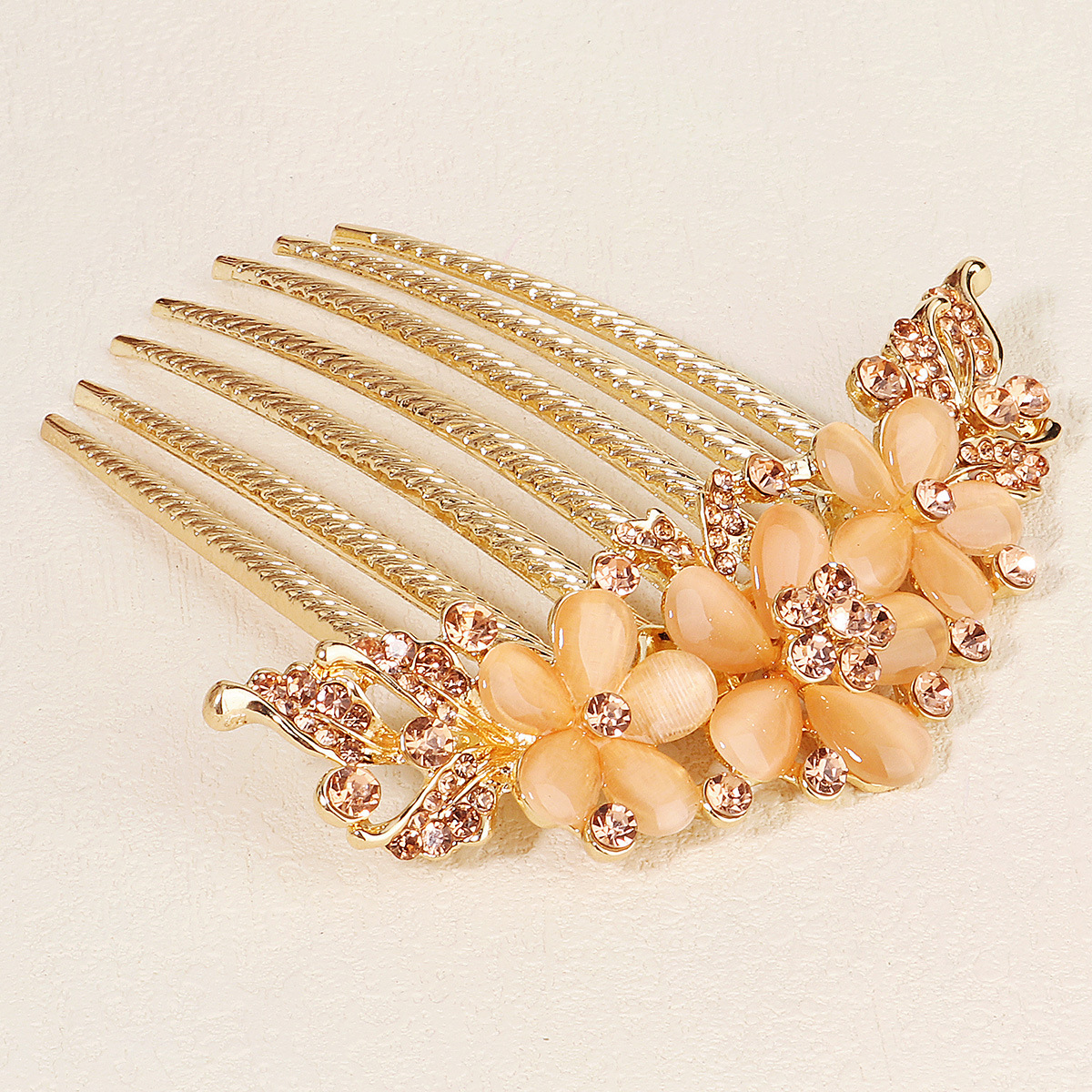 New European and American party accessories, hair accessories, alloy sunflower hair comb, cat's eye stone water diamond seven-toothed bridal bun hair comb details Picture