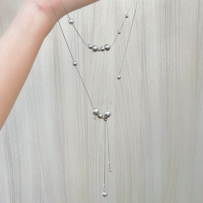 A cold and cool silver-gray pearl starry sky layered neckchain, a long necklace, a girl's hot girl, a niche design sense collarbone chain Application Scenario