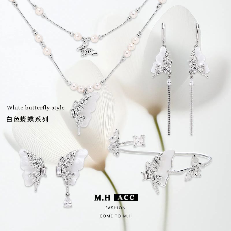 Cold ins white butterfly earrings 925 Autumn/Winter, high-end and super fairy-like stud earrings wholesale new fashionable and elegant earrings full figure