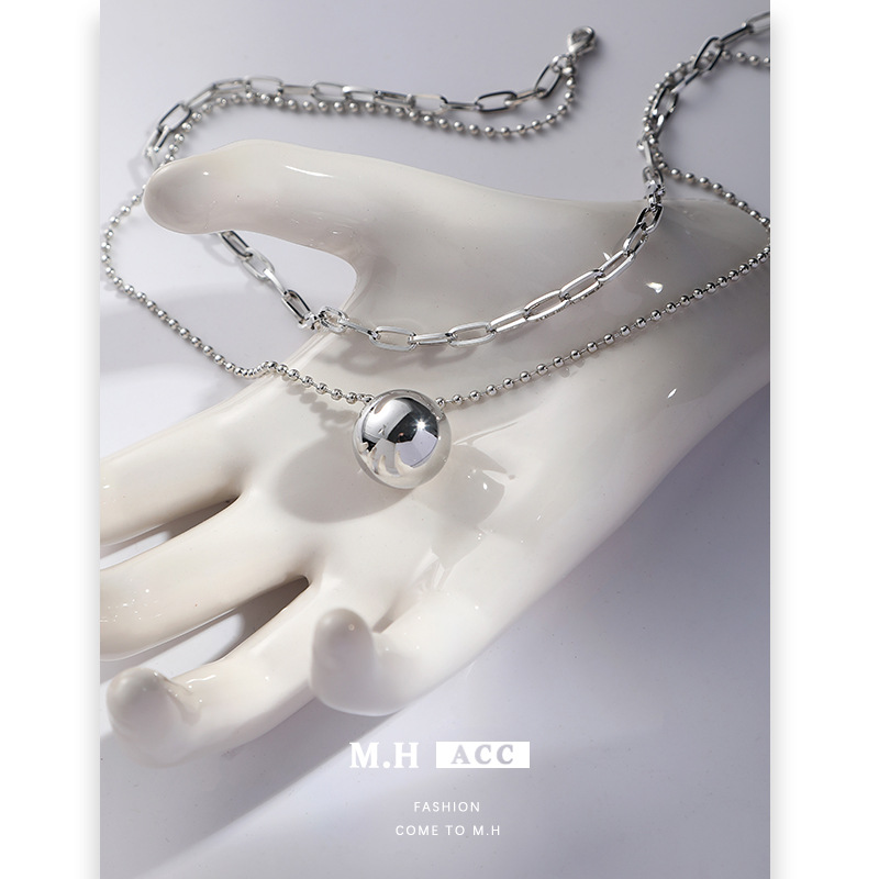 The simple style round bead stacked necklace is a fashionable and versatile cross-border accessory for women. The sweater chain is unique and individualistic details Picture