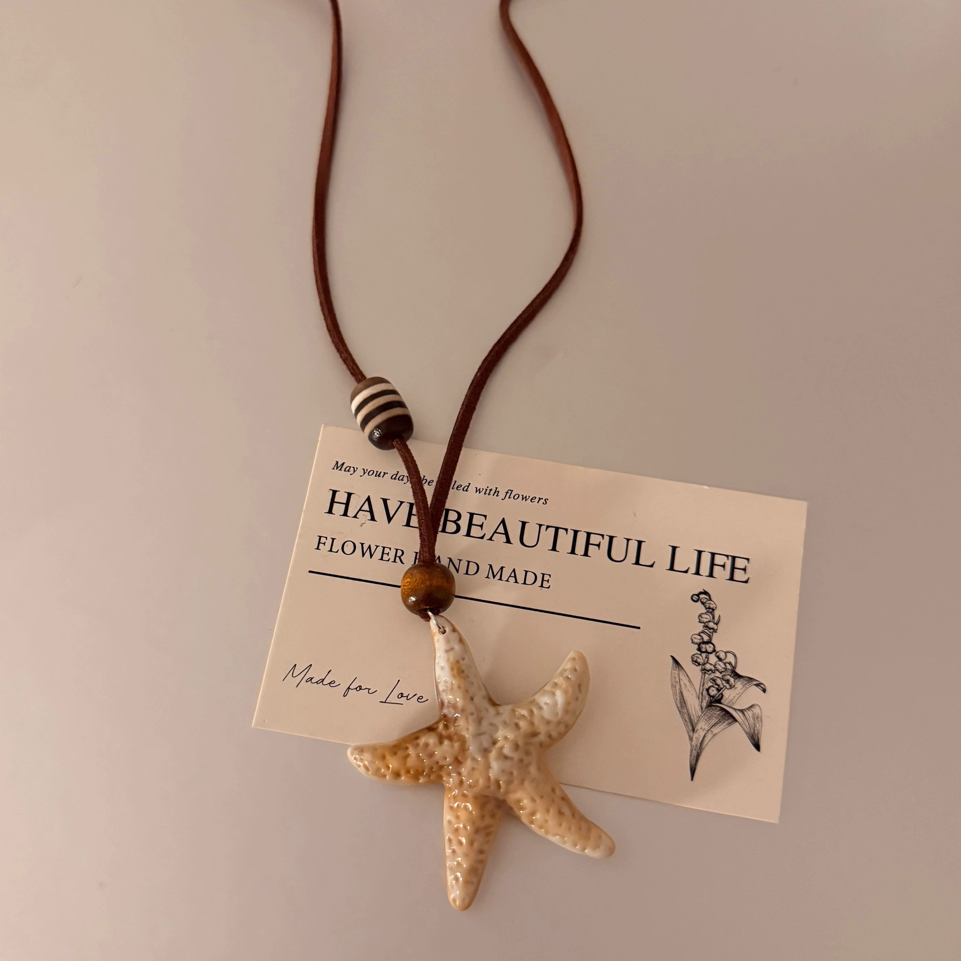 Simple Starfish Korean style Instagram pie large Star long necklace, women's design sense adjustable seaside high-end sweater chain Application Scenario