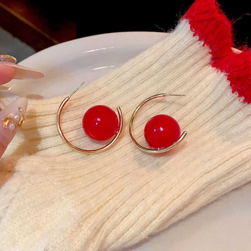 Red unique earrings, a new bestseller for women in autumn and winter, with a light luxury style and a high-end feel. The ear studs are niche and exaggerated New Year earrings Specification drawing