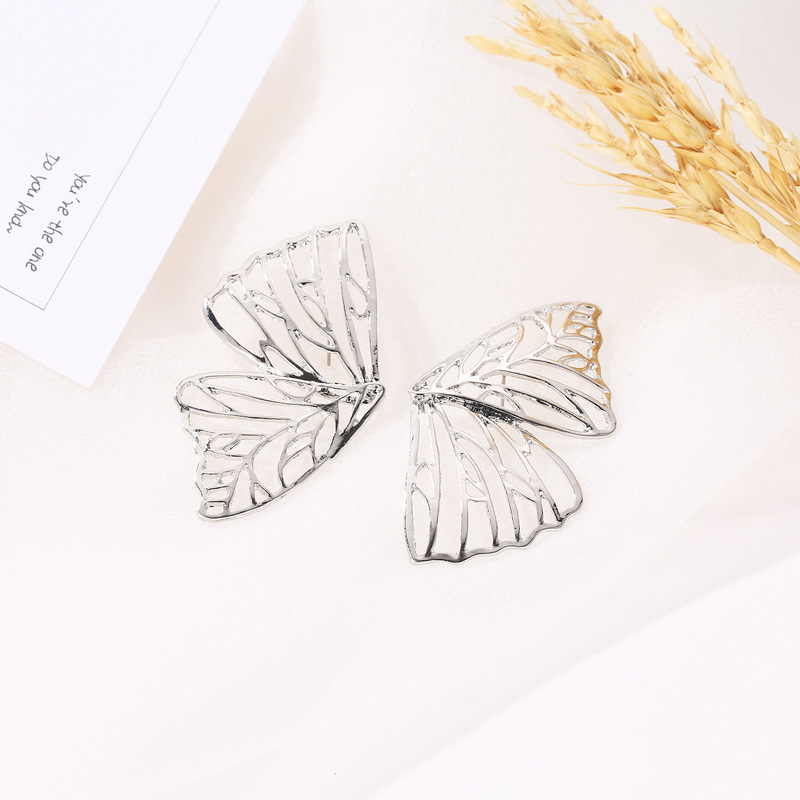 Wish AliExpress is selling exaggerated hollowed-out butterfly wing stud earrings and Middle Eastern trend fan-shaped creative earrings wholesale Application Scenario