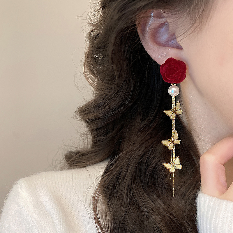 Red flower earrings, long butterfly tassel stud earrings, new autumn and winter women's light luxury and high-end style earrings Application Scenario