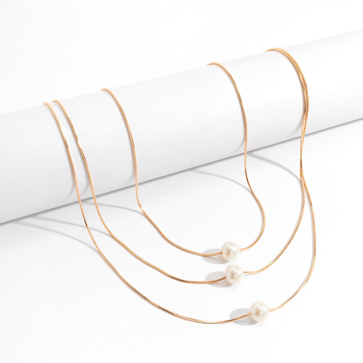 European and American cross-border jewelry, French multi-layer layered imitation pearl pendant necklace, geometric fine chain snake bone necklace Application Scenario