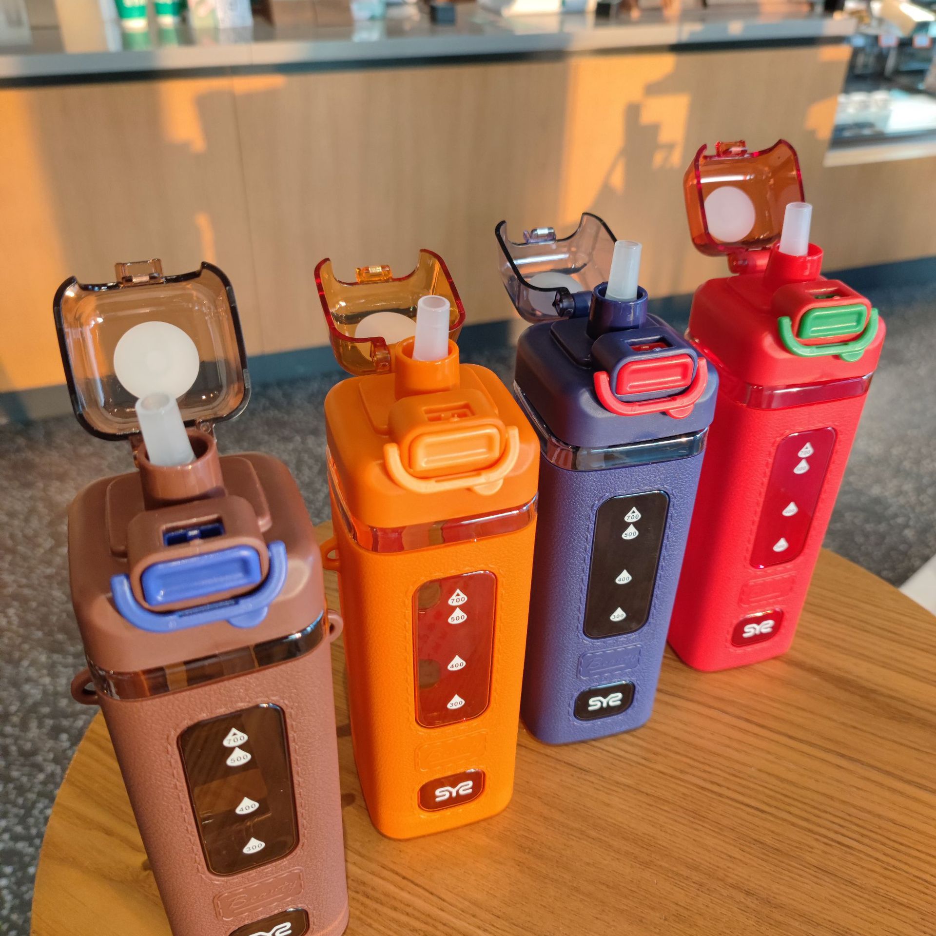 Wholesale cross-border best-selling new square straw plastic water cups with high appearance level, rubber-coated portable drawstring, and bouncing lid water bottles details Picture