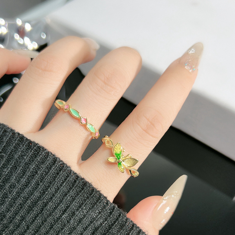 The small peach star pink and green color drip glaze ring with a light luxury and niche design sense for women, a fashionable butterfly personality ring Specification drawing