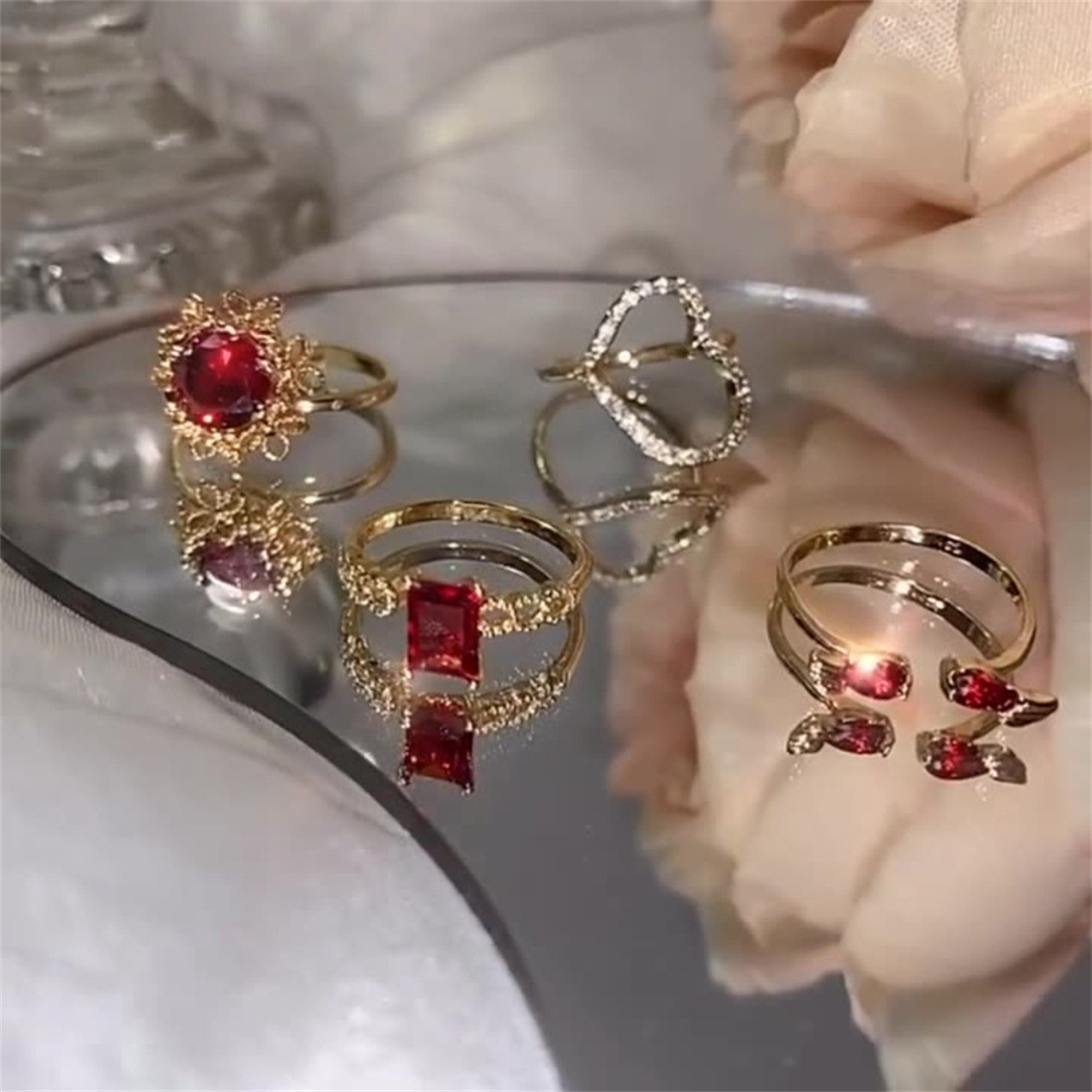 A new versatile French retro, niche, fashionable, light luxury and high-end ring with diamond-encrusted red gemstones for women details Picture