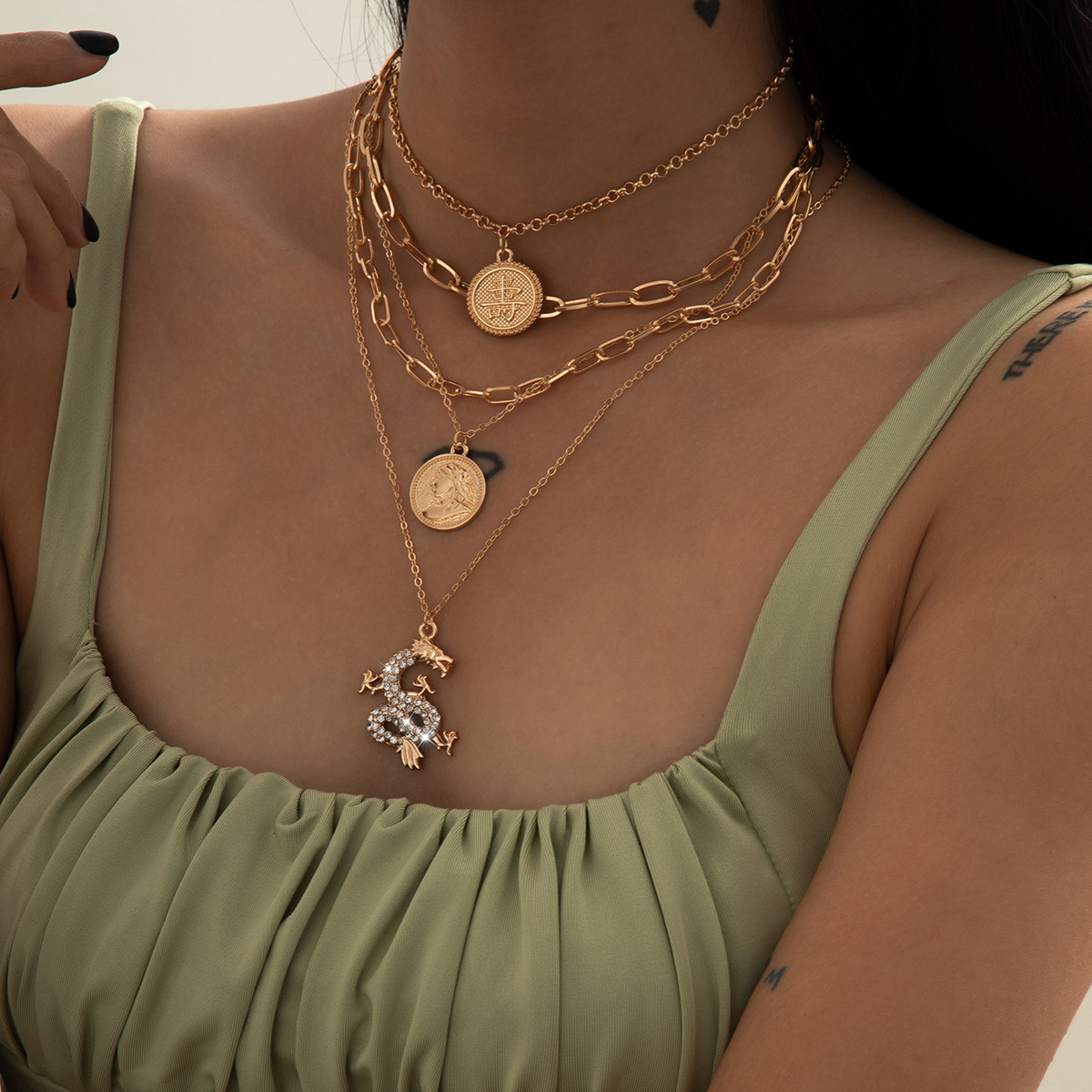 This is a stylish and elegant cross-border accessory from Europe and America. It features a diamond-encruffled dragon-shaped necklace that is unique and fashionable for women. It also includes a longevity character portrait round pendant necklace details Picture