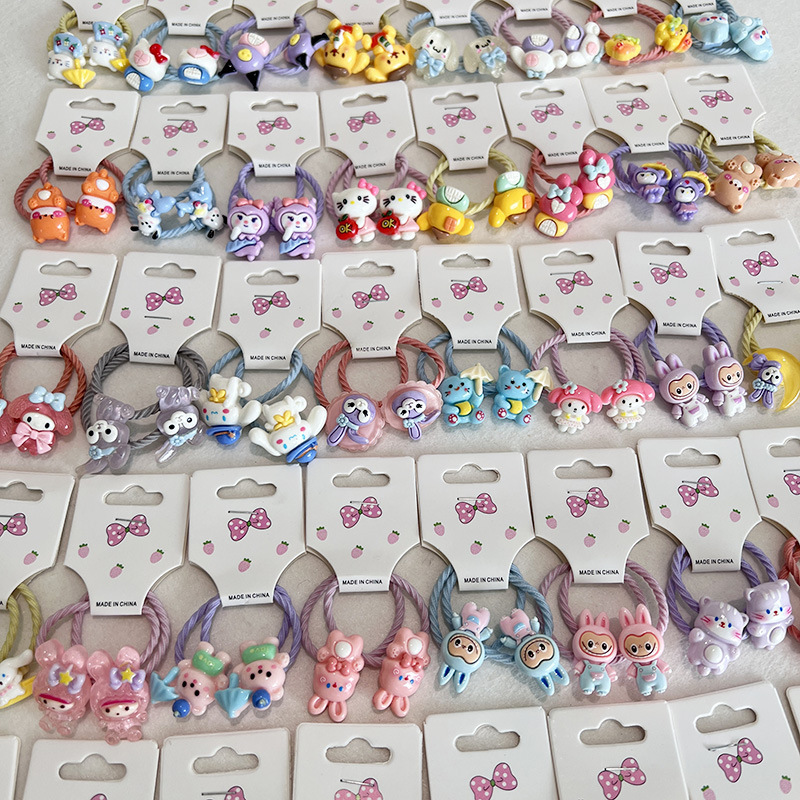 The cartoon cute children's hair band is highly elastic and durable. It won't damage the hair of girls and babies. Tie the hair with a hair band details Picture