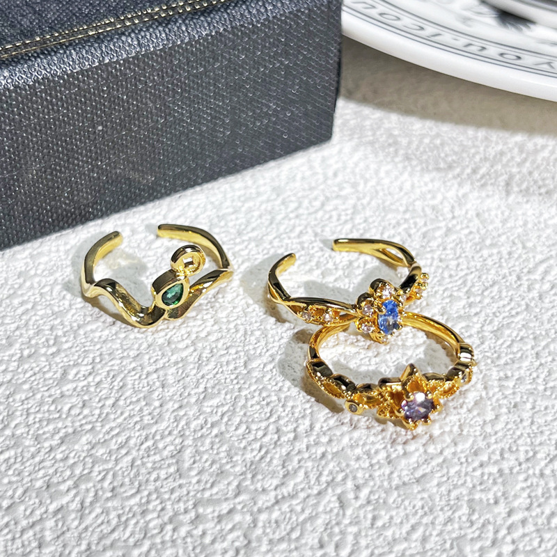 A small open ring with a court style starlight purple diamond, simple and elegant, and a retro, sweet and cool, versatile ring accessory made of sea blue zircon Application Scenario