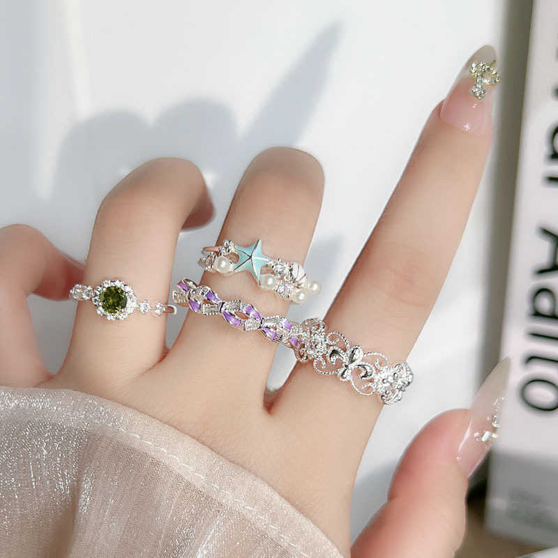 New Chinese-style retro hollowed-out iris flower simple open ring, feminine charm bow, star pearl fashionable ring details Picture