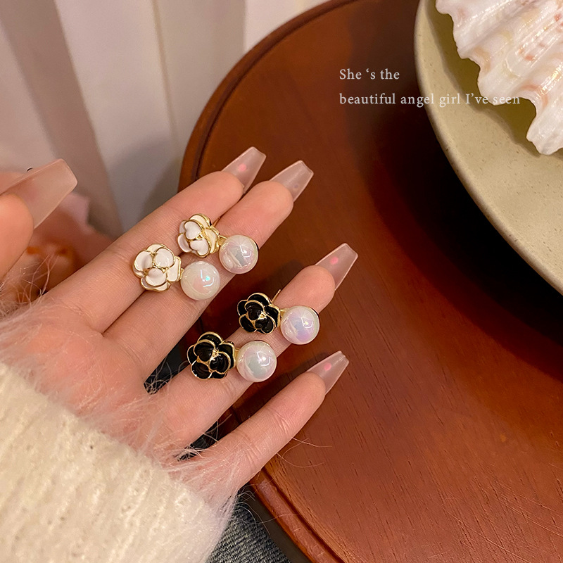French retro mermaid pearl flower earrings, women's fashion, high-end design sense, versatile stud earrings and earrings wholesale full figure