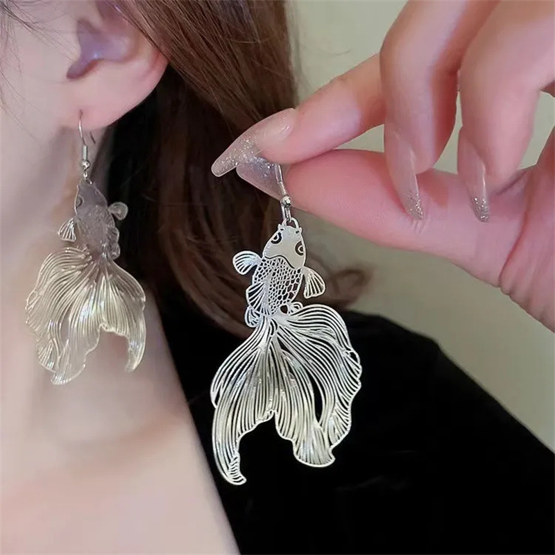 Creative design sense koi fish earrings, women's European and American exaggerated light luxury earrings, metal cold style ear hooks and earrings Application Scenario