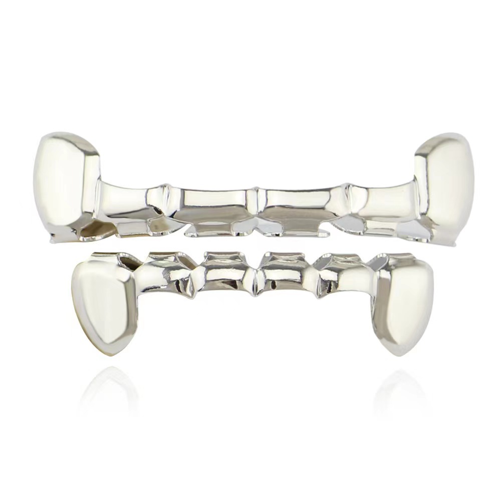 The cross-border best-selling Hippop18K hip-hop flat tooth hollowed-out tiger tooth braces from Europe and America are fashionable and trendy items details Picture