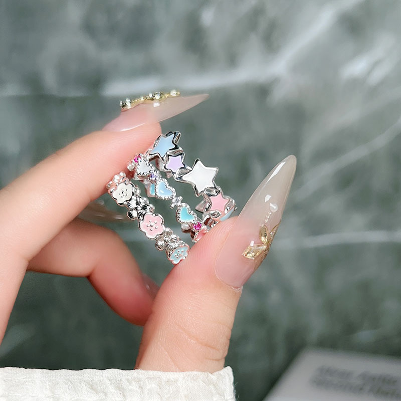 A trendy Korean version, cute style, colorful glazed star opening ring, a sweet and cool ring with a heart and flowers Application Scenario
