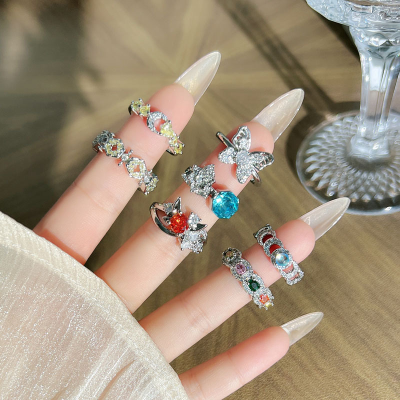 The 2025 new light luxury colored gemstone series sweet and cool flower style open ring is a delicate, versatile and fashionable index finger ring for women full figure