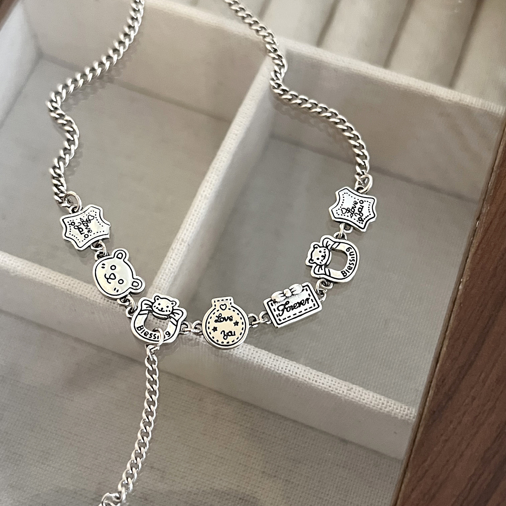 Gingerbread Man Necklace Silver 2023 New Women's light luxury niche design neckchain Hip-hop sweater chain Application Scenario