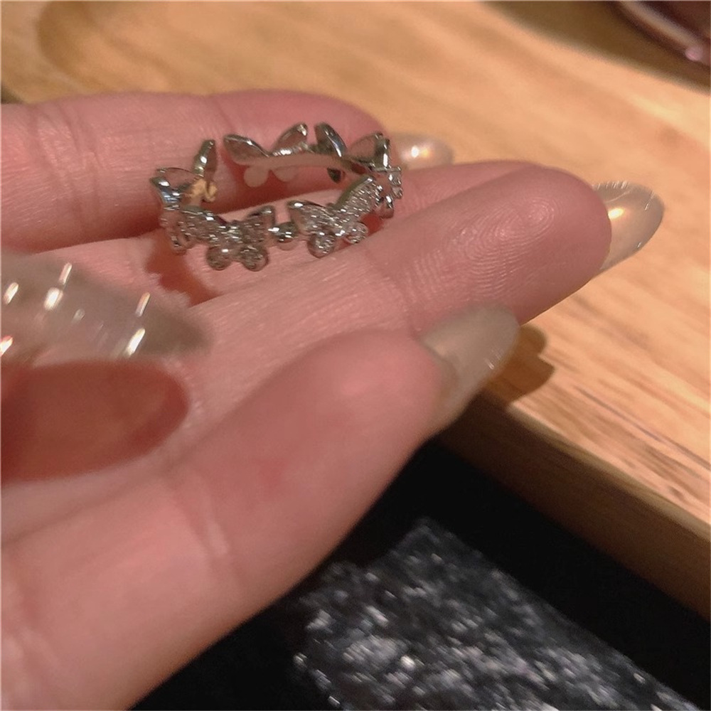 Korean super flash zircon butterfly ring, a women's light luxury style, full diamond, versatile open index finger ring, a heavy and high-end ring Application Scenario