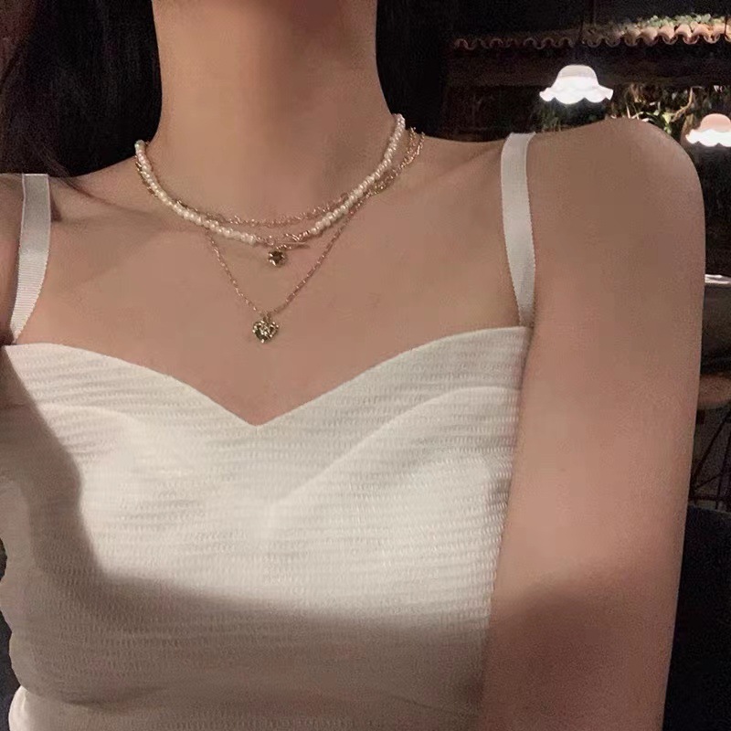 Three-layer pearl heart-shaped necklace for women's summer, with a light luxury and niche design sense collarbone chain, retro ins neck chain details Picture