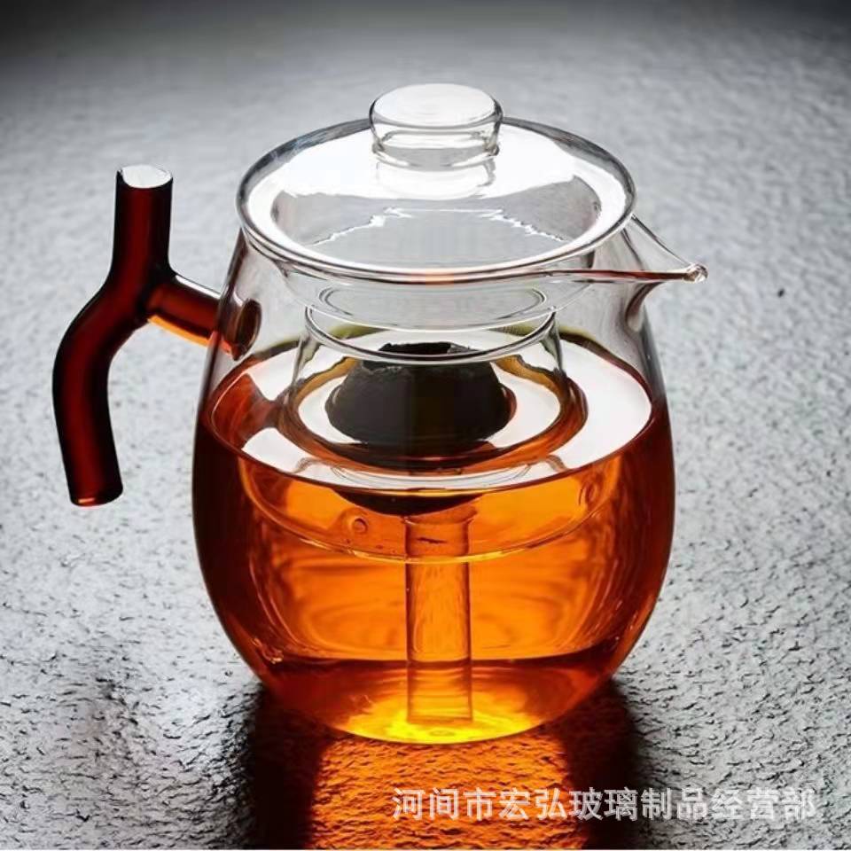A small green tangerine tea brewing set, a glass fair cup, a red-handled filtering flower tea teapot, a glass cup tea brewing set details Picture