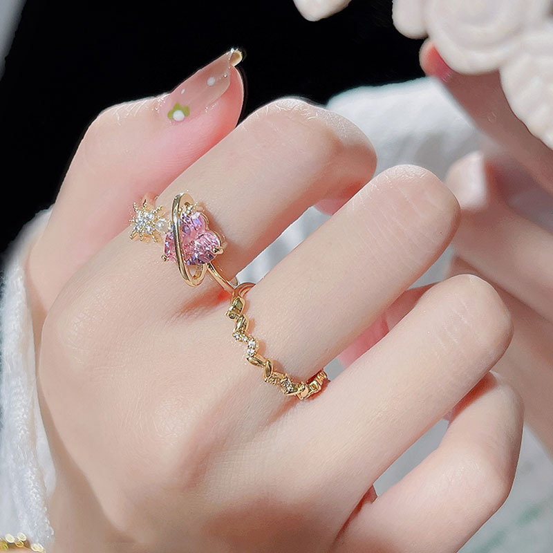 Japanese-style cute heart-shaped pink zircon ring, elegant, light luxury, niche and sweet girl's open index finger ring full figure