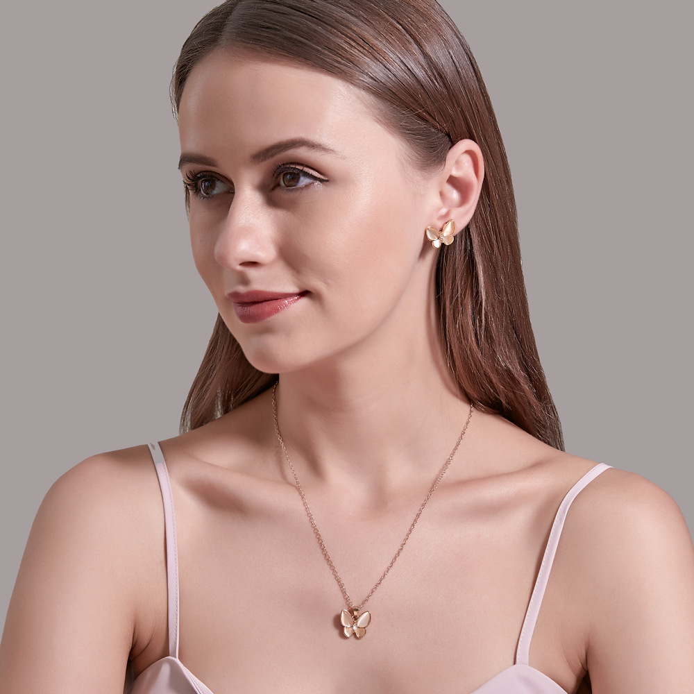 The new set of jewelry from Europe and America is simple and versatile. It features an elegant cat's eye butterfly necklace and white mother-of-pearl butterfly earrings details Picture