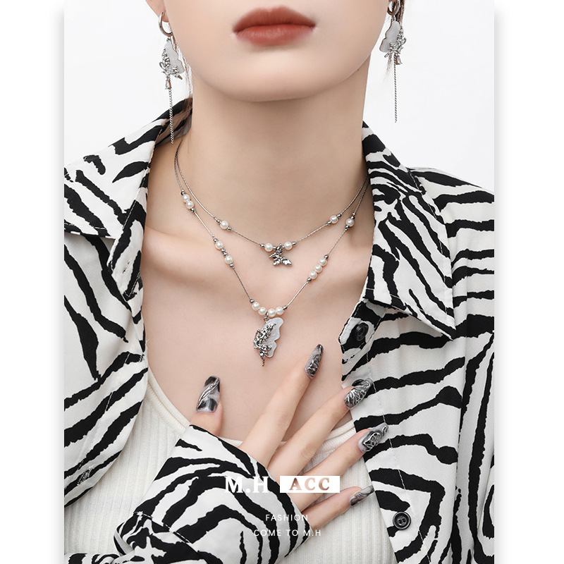 Cold ins white butterfly earrings 925 Autumn/Winter, high-end and super fairy-like stud earrings wholesale new fashionable and elegant earrings details Picture