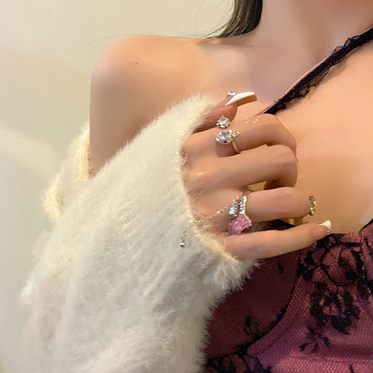 Korean version pink zircon stacked geometric tassel chain opening adjustable ring, women's Instagram niche design, high-end full figure