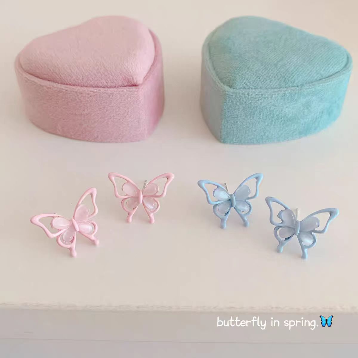 Spring new cat's eye stone powder blue small butterfly stud earrings, women's silver needle, super fairy-like, versatile and sweet three-dimensional earrings for daily use details Picture