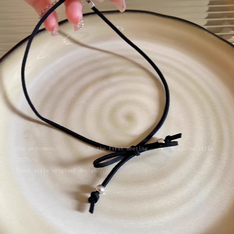 Bow cross necklace, a light luxury and niche design accessory for women, with a cold and fashionable style and a hot girl collarbone chain Application Scenario