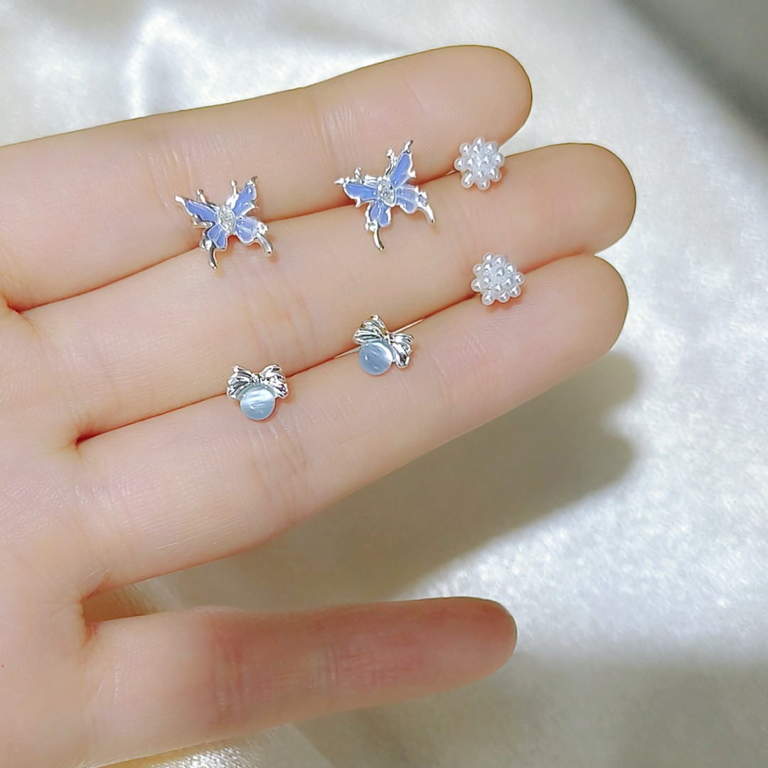 Six-piece set! Dynamic, high-end, niche design sense, versatile, small stud earrings, women's Instagram starry sky blue butterfly earrings and earrings details Picture