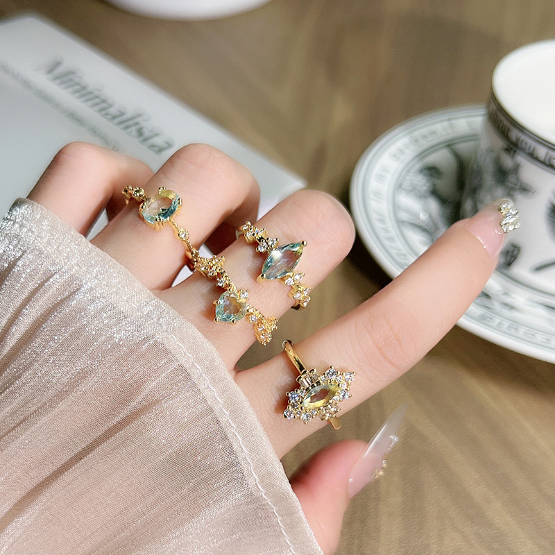 The high-end and trendy sea blue zirconium oval pigeon egg blue ring is exquisite and versatile for women. It can be worn in layers and exudes a geometric charm details Picture