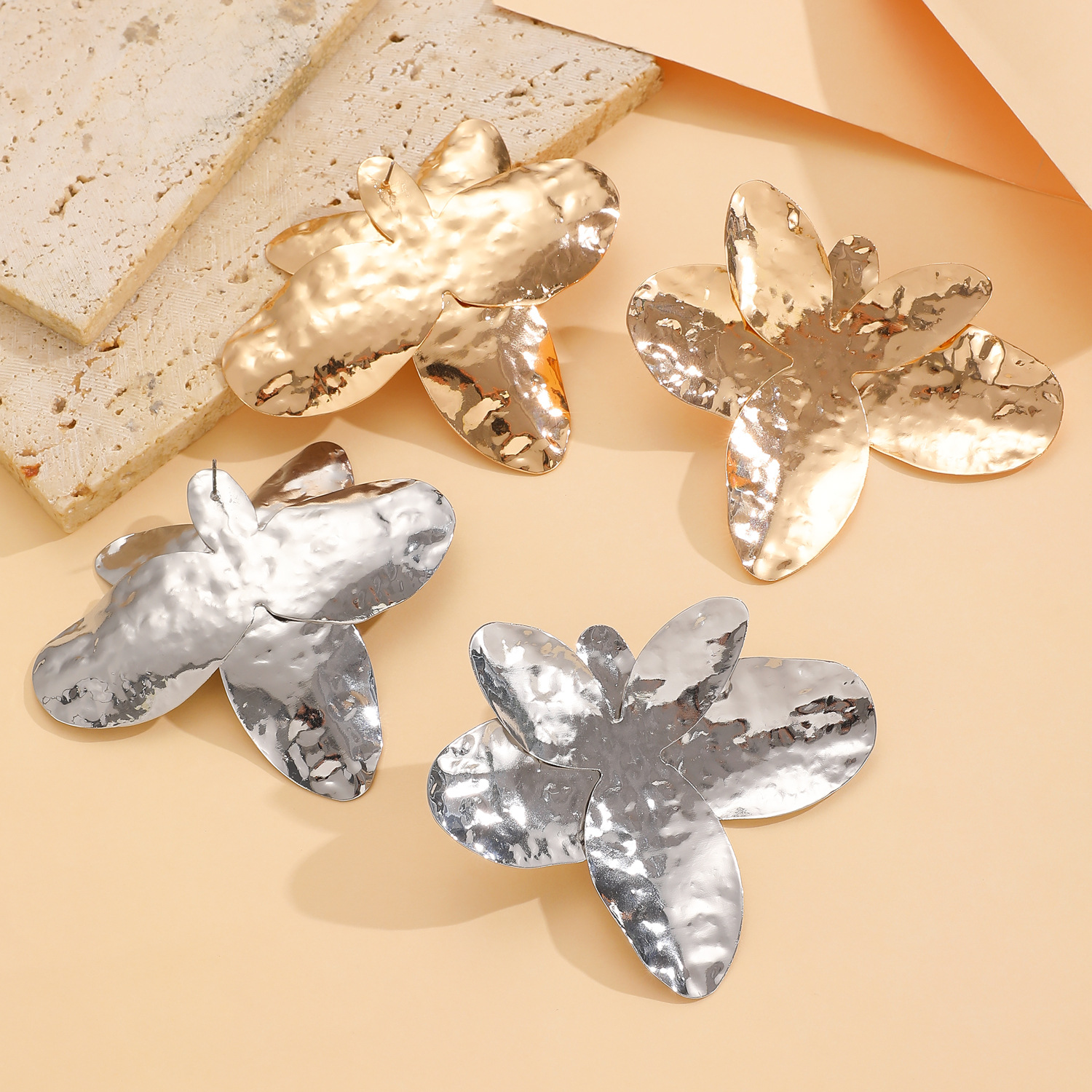 European and American cross-border fashion exaggerated irregular pleated petal earrings women 's personalized flower stud earrings Application Scenario