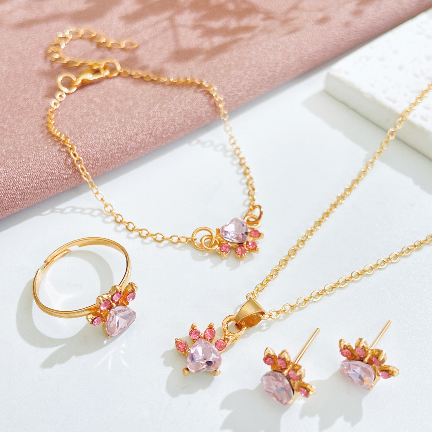 Korean fashion set, cute cartoon cat paw necklace, stud earrings, four-piece set, cat footprint zircon ring, bracelet for women Specification drawing