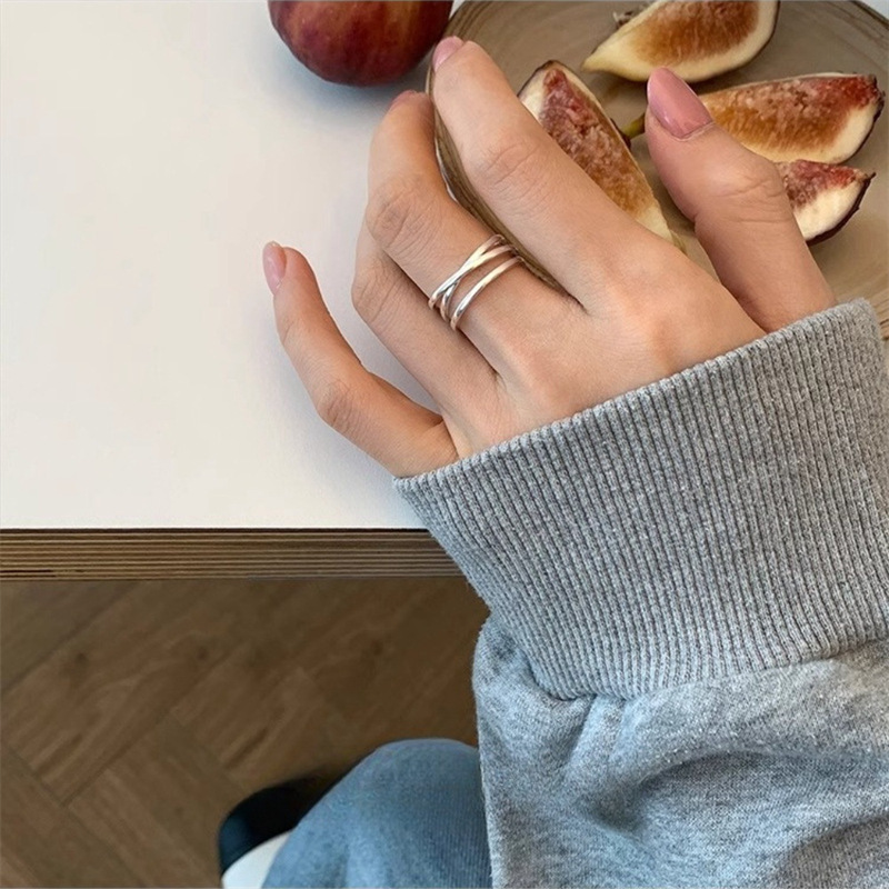 A simple 925 sterling silver cross three-layer ring from South Korea, a cold and elegant index finger ring for women, with a niche design and an open ring full figure