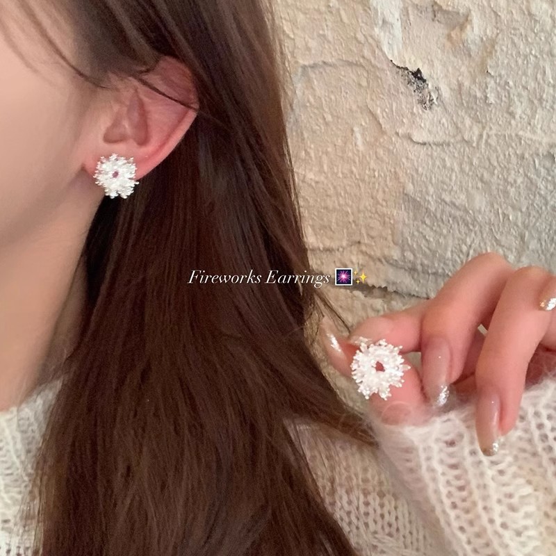 The dazzling zirconium firework pearl stud earrings are perfect for winter, featuring a light luxury and elegant style. The stud earrings are a unique and niche design for women full figure