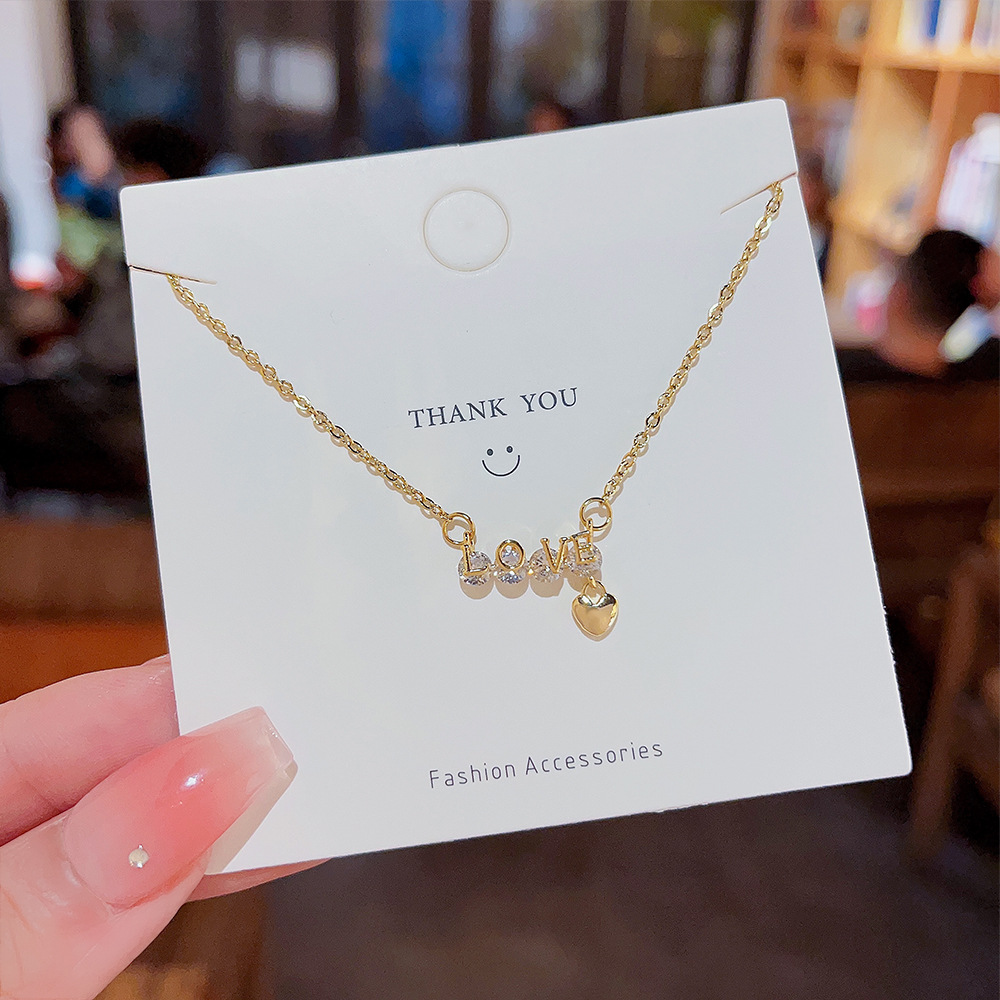 Micro-inlaid zircon heart-shaped pendant, ins-style light luxury titanium steel necklace, women's niche design, Internet celebrity bestseller, collarbone chain trend full figure