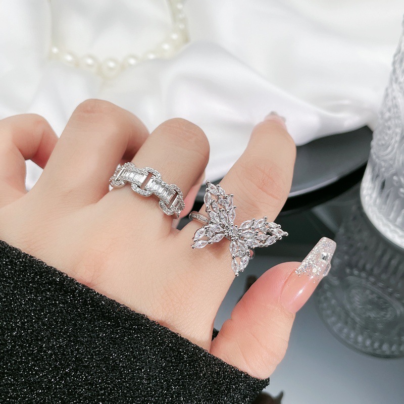 This exquisite, fully diamond-encrusted, popular butterfly opening ring for women exudes a sweet, cool, light luxury and high-end vibe. The layered ring is extremely ethereal and versatile details Picture
