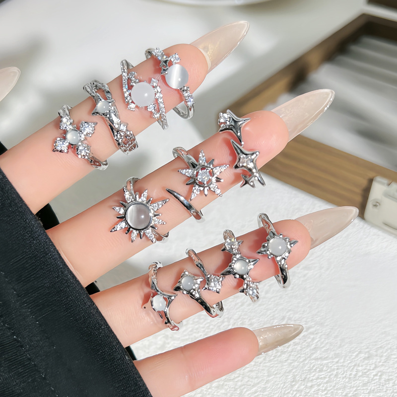 A niche, light luxury sunflower-like, star-shaped open ring for women on Instagram, with a cold style and irregular texture details Picture