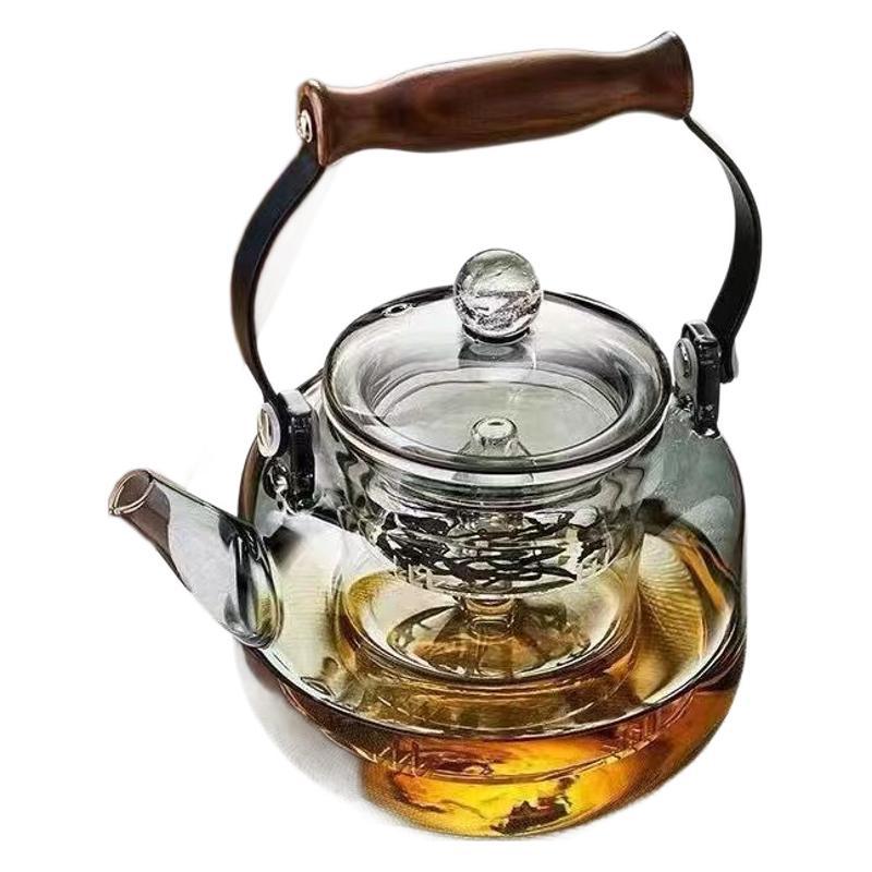 This is a large-capacity household steaming and boiling teapot with a handle. It is made of smoke grey wood and has a starry sky handle. It is a glass boiling teapot Item Picture