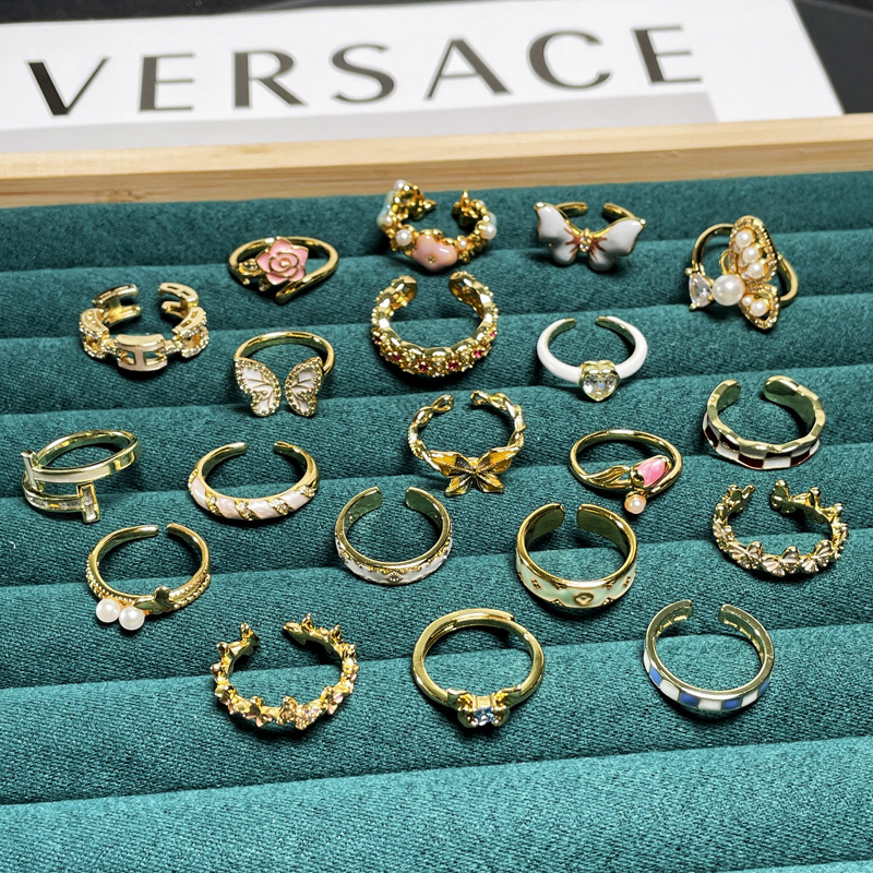 Light luxury enamel drop glaze butterfly flower ring, a niche design for women, fashionable and versatile, with a high-end feel. Adjustable index finger ring Application Scenario