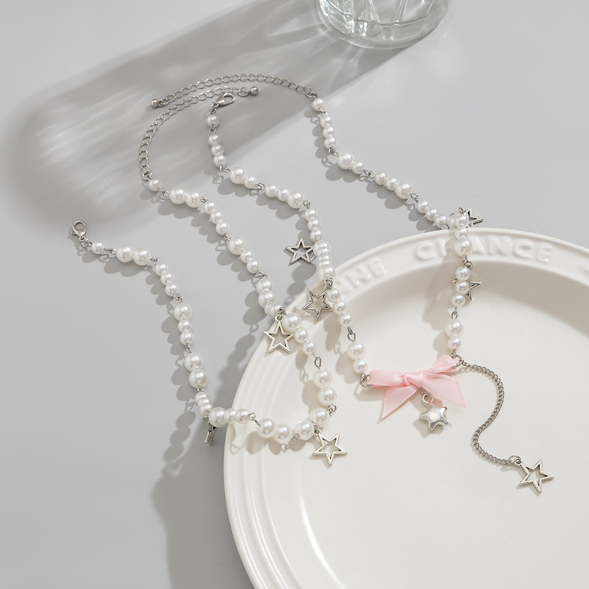 European and American cross-border jewelry, sweet pearl beaded collarbone chain set, fresh and cute bow pendant, multi-layer necklace Application Scenario