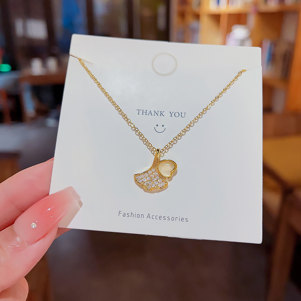 Ginkgo leaf cat's eye stone titanium steel necklace for women on Instagram, cold style, high-end, versatile, simple collarbone chain, fashionable neck chain details Picture