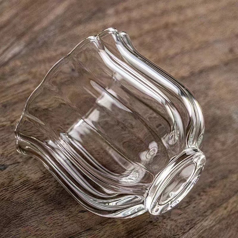 Creative glass cups, simple household tea tasting cups, tea cups, popular water cups, high borosilicate heat-resistant glass tea cups, lotus cups Specification drawing