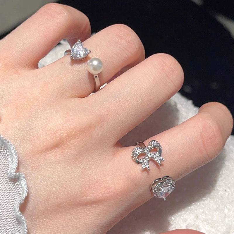 Sweet and cool style heart-shaped girl pearl zircon light luxury open ring bow, fashionable, individual, simple and exquisite ring full figure