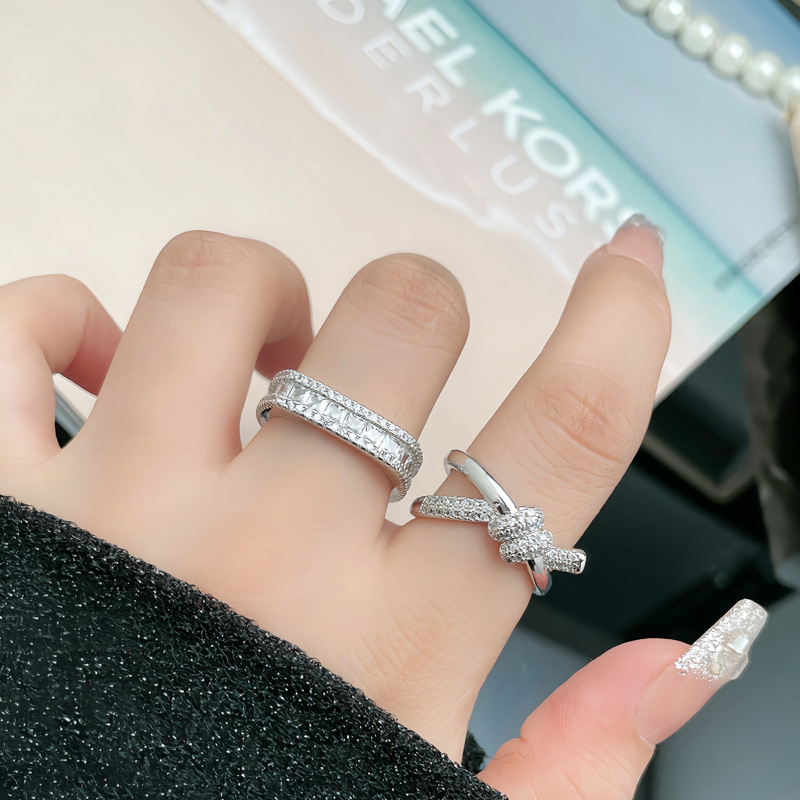 A light luxury and high-end, niche twisted opening ring for women, fashionable, individual, exquisite and cold style, square food ring with row diamonds details Picture