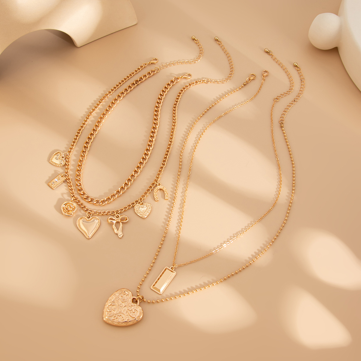 European and American cross-border jewelry punk cross alloy pendant collarbone chain, simple heart pattern snake bone chain necklace Application Scenario